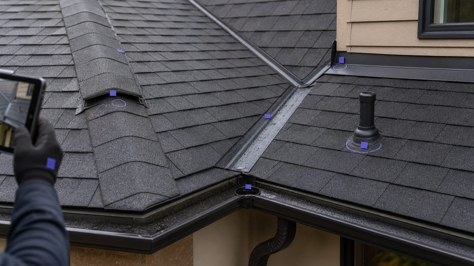 Asphalt roof planes, flashing, vents, gutters, and marked inspection zones